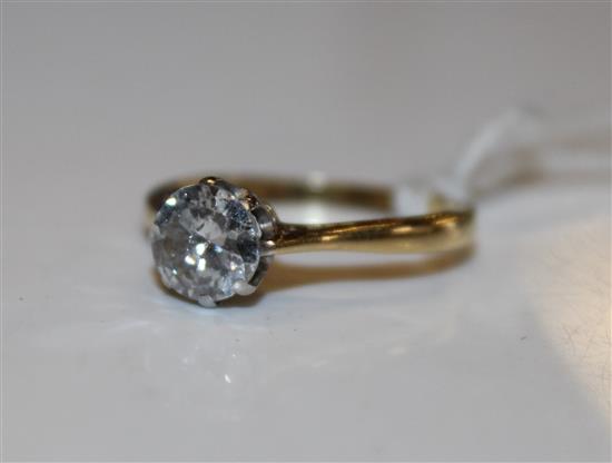 An 18ct gold and platinum, solitaire diamond ring, size O.